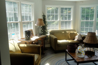 Inspiration for a mid-sized timeless open concept ceramic tile family room remodel in Other with white walls and no fireplace