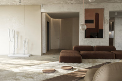 Small minimalist loft-style limestone floor and beige floor living room photo in Miami with beige walls