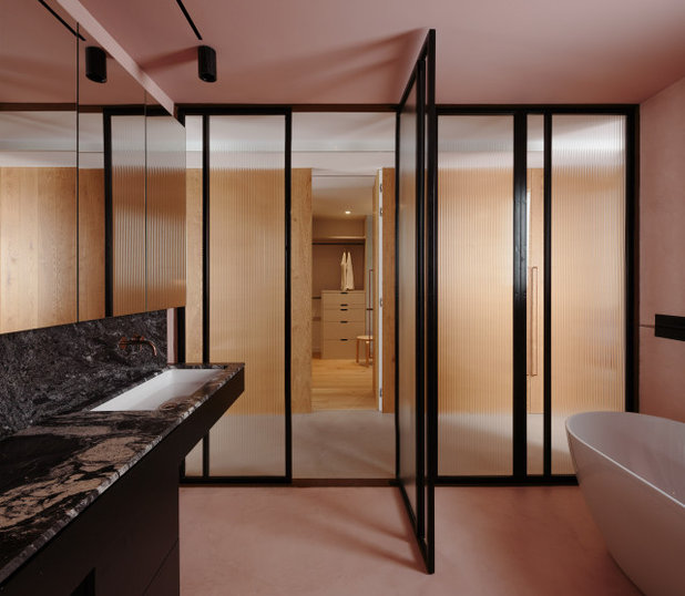 Moderno Cuarto de baño by Raúl Sánchez Architects