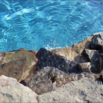 Rock Swimming Pool & Spa With Waterfall and Fire Pit