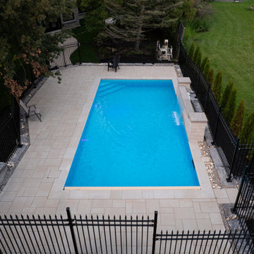 Rectangular Pool with Sheer Descent Water Wall & Automatic Safety Cover — Estate