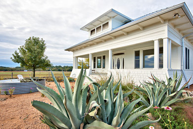 Inspiration for a cottage exterior home remodel in Austin
