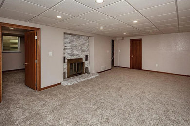 Example of a cottage basement design in Other