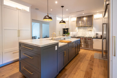 Kitchen - craftsman kitchen idea in Los Angeles with recessed-panel cabinets