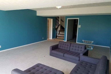 Example of a beach style living room design in Omaha