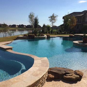 Freeform Travertine Pool with Negative Edge