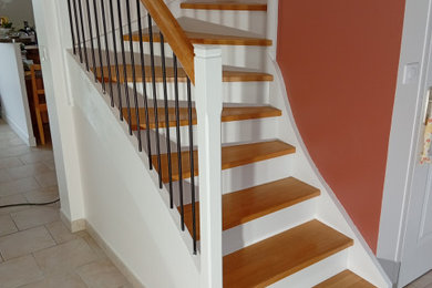 Idée de décoration pour un escalier tradition.