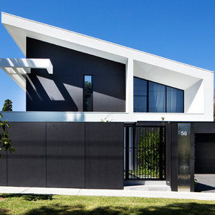Zweistöckiges, Schwarzes Modernes Einfamilienhaus mit Pultdach in Melbourne