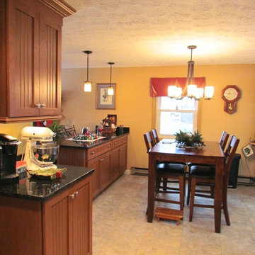 Transitional Peru Kitchen Remodel with Uba Tuba countertop.