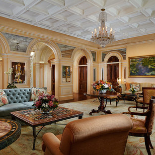 This is an example of a mediterranean formal enclosed living room in Other with multi-coloured walls, dark hardwood flooring, a standard fireplace and brown floors.