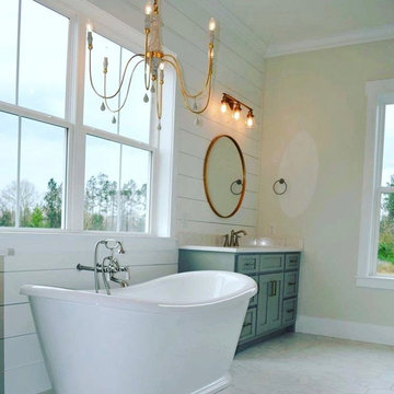 Modern Farmhouse: Stand-alone bathtub and shiplap walls