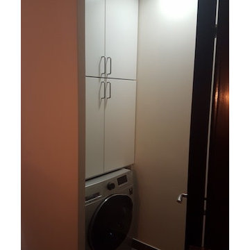 Powder room makeover combined with laundry
