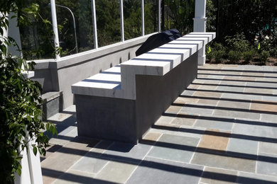 Example of a patio kitchen design in Orange County