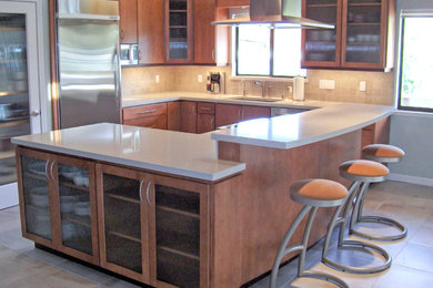 Large trendy u-shaped ceramic tile eat-in kitchen photo in San Francisco with an undermount sink, flat-panel cabinets, medium tone wood cabinets, quartz countertops, stainless steel appliances, an island, beige backsplash and ceramic backsplash