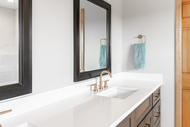 Example of a transitional master white tile and porcelain tile ceramic tile, beige floor and double-sink bathroom design in Minneapolis with shaker cabinets, dark wood cabinets, red walls, an undermount sink, quartz countertops, white countertops and a built-in vanity
