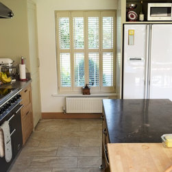 Plantation shutters to complete kitchen decor - Interior Shutters
