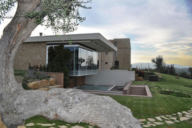 Inspiration for an expansive contemporary exterior in Other.