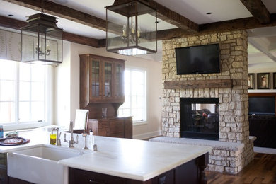 Example of a classic kitchen design in Other with an island
