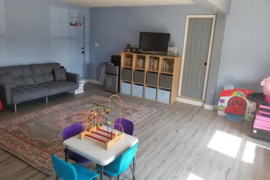 Inspiration for a small modern attached two-car garage workshop remodel in Columbus