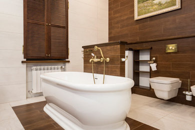 Photo of an expansive midcentury bathroom in Moscow with brown tile, brown walls and a wall-mount toilet.