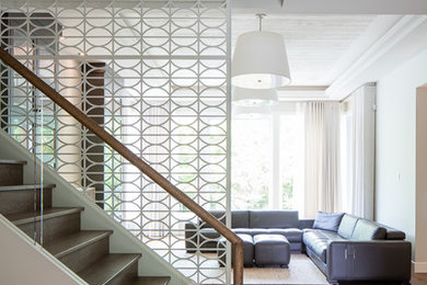 Example of a large trendy home design design in Montreal
