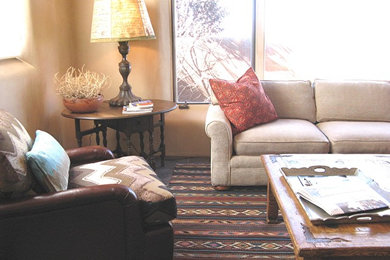 Mid-sized southwest home design photo in Other