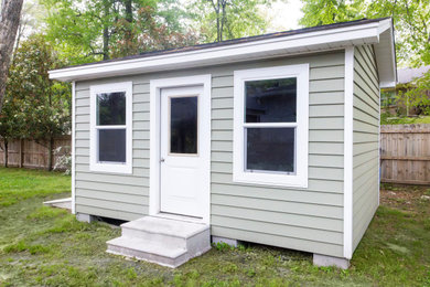 Example of a small farmhouse detached studio / workshop shed design in New Orleans
