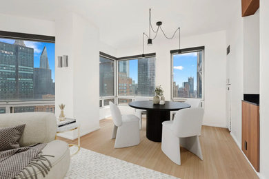 Example of a trendy dining room design in New York