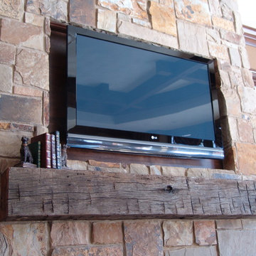 Rustic Mantle in Stone Fireplace with Recessed Area for TV