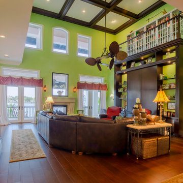 Grand Two-Story Living Room With Bold Design And Expansive Windows