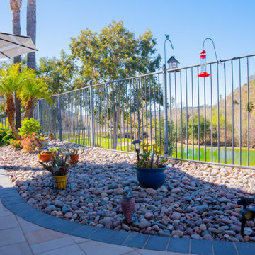 Elegant Outdoor Transformation with Retaining Wall & Paver Design