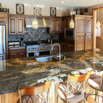 Open Kitchen with "Volcanic" Granite Island