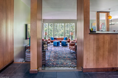 Mid-sized transitional open concept carpeted family room photo in Nashville with beige walls and a wall-mounted tv