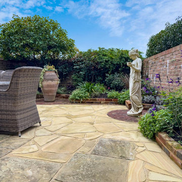 Italian Courtyard with a ornate garden statue
