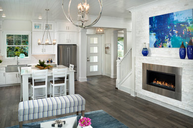 Example of a country living room design in Tampa
