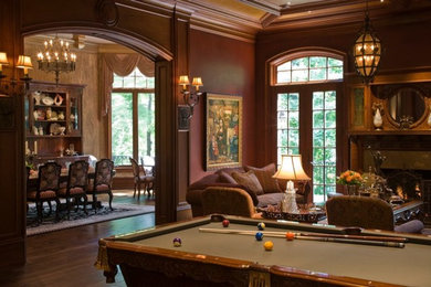 Inspiration for a large timeless formal and enclosed carpeted living room remodel in Detroit with red walls, a standard fireplace, a tile fireplace and no tv