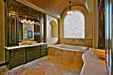 Tuscan bathroom photo in Dallas