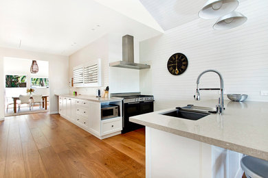 Kitchen - coastal kitchen idea in Sydney