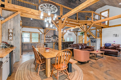 Inspiration for a large rustic concrete floor and multicolored floor dining room remodel in Burlington