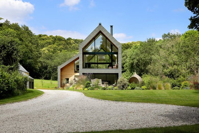 Inspiration for a contemporary house exterior in Surrey.