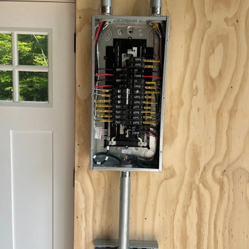 A new subpanel for a garage or workshop, piped in conduit and fully labeled