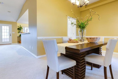 Example of a transitional dining room design in Miami