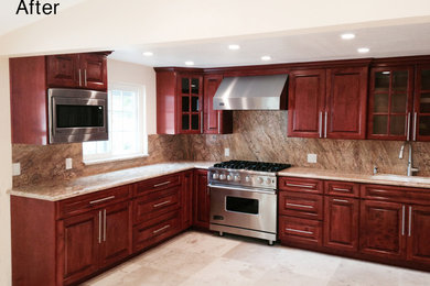 Inspiration for a large contemporary l-shaped limestone floor kitchen remodel in Los Angeles with a double-bowl sink, raised-panel cabinets, dark wood cabinets, granite countertops, brown backsplash and stainless steel appliances