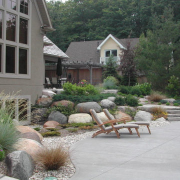 granite boulder retaining w/natural irregular slab steps
