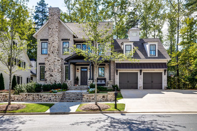 Trendy multicolored two-story brick house exterior photo in Atlanta