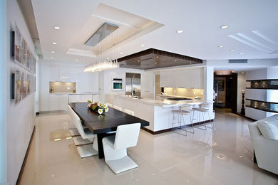 Living room - living room idea in Miami with white walls
