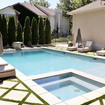 (Near spa, with loungers): Clean lines, tranquil water, and relaxing loungers in