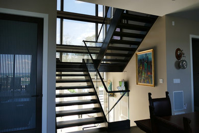 Inspiration for a large contemporary painted u-shaped open staircase remodel in Other