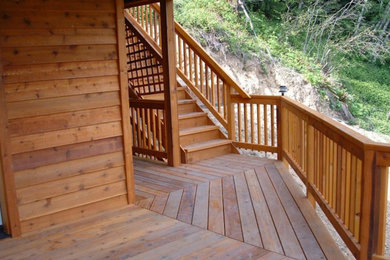 Inspiration for a mid-sized deck remodel in Other with a roof extension