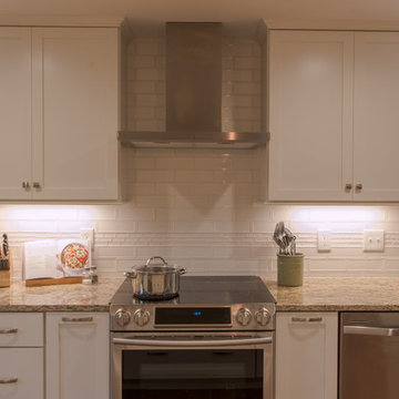 Symmetry around the range with matching wall cabinets and excellent storage!